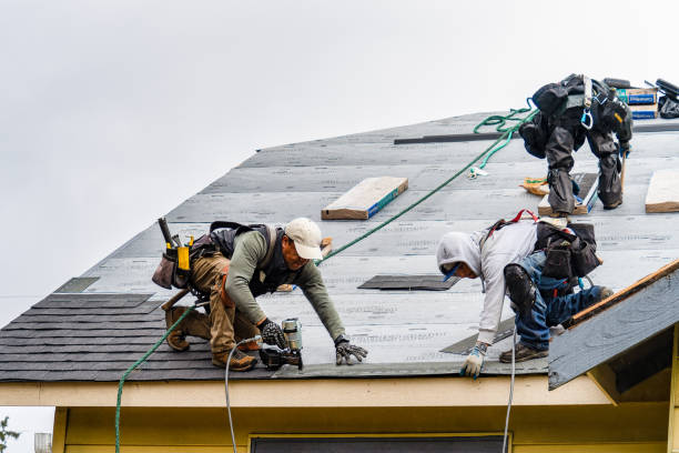 Professional Gutter Installation technician working in South Park, WY